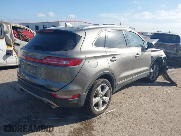 2017 Lincoln MKC Premiere with VIN 5LMCJ1D92HUL71022, listed as a IAAI auction lot 38628790 with 141,930 mi miles. Bid and sale history available at carsss.com. Image 4.
