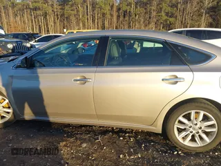 2013 Toyota Avalon XLE with VIN 4T1BK1EB2DU067941, listed as a IAAI auction lot 41321943 with 159,524 mi miles and . Bid and sale history available at DreamBid. Image 14.