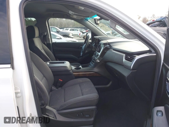 2020 Chevrolet Tahoe LS with VIN 1GNSCAKC6LR197289, listed as a IAAI auction lot 41429866 with 127,071 mi miles and . Bid and sale history available at DreamBid. Image 5.