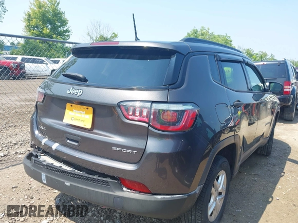 2018 Jeep Compass Sport with VIN 3C4NJDAB7JT235218, listed as a IAAI auction lot 42473771 with 106,302 mi miles and . Bid and sale history available at DreamBid. Image 4.