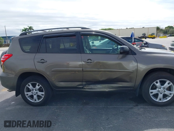 2012 Toyota RAV4 with VIN 2T3BF4DV4CW237305, listed as a IAAI auction lot 41590091 with 114,757 mi miles and . Bid and sale history available at carsss.com. Image 13.