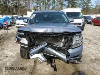 2015 Chevrolet Suburban LT with VIN 1GNSKJKC0FR646425, listed as a Copart auction lot 44880954 with 116,995 mi miles and . Bid and sale history available at DreamBid. Image 5.