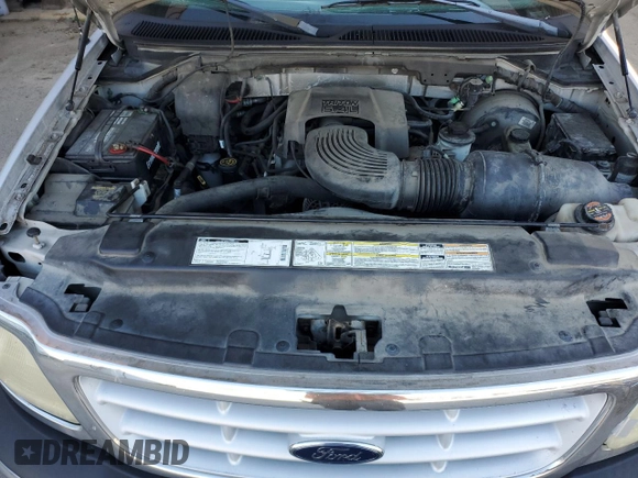 1999 Ford F-150 XL with VIN 1FTRF17L7XNA73732, listed as a Copart auction lot 74388514 with Not provided miles and Clean title. Bid and sale history available at DreamBid. Image 11.