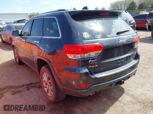 2015 Jeep Grand Cherokee Overland with VIN 1C4RJFCG6FC831641, listed as a IAAI auction lot 41877680 with 143,568 mi miles. Bid and sale history available at carsss.com. Image 3.