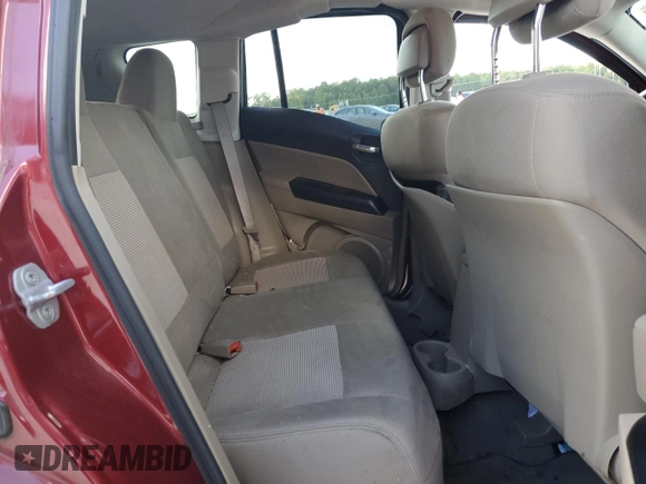 2011 Jeep Compass with VIN 1J4NT1FB4BD194839, listed as a Copart auction lot 73001014 with 113,050 mi miles and Salvage Title. Bid and sale history available at carsss.com. Image 12.