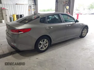 2016 Kia Optima LX with VIN 5XXGT4L33GG026183, listed as a IAAI auction lot 42156799 with 163,000 mi miles and . Bid and sale history available at carsss.com. Image 4.