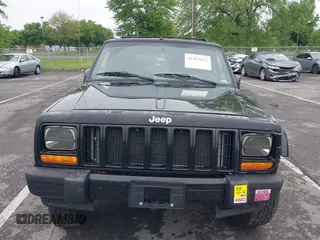2000 Jeep Cherokee with VIN 1J4FF48S5YL182045, listed as a IAAI auction lot 42262612 with 192,292 mi miles and . Bid and sale history available at DreamBid. Image 12.