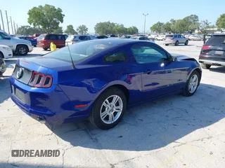 2013 Ford Mustang V6 with VIN 1ZVBP8AM5D5262560, listed as a IAAI auction lot 42136648 with 71,301 mi miles and . Bid and sale history available at carsss.com. Image 4.