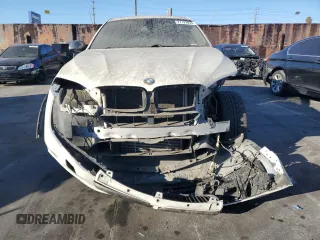 2016 BMW X6 sDrive35i with VIN 5UXKU0C56G0F92990, listed as a Copart auction lot 77191074 with 194,077 mi miles and Salvage Title. Bid and sale history available at carsss.com. Image 5.
