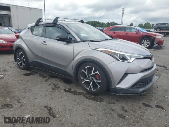 2018 Toyota C-HR XLE with VIN NMTKHMBX9JR002751, listed as a Copart auction lot 55694125 with 114,790 mi miles and Salvage title. Bid and sale history available at DreamBid. Image 4.