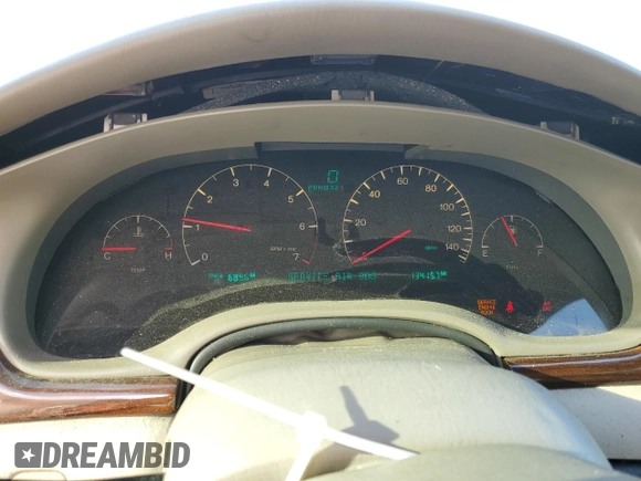 2003 Cadillac Seville Touring STS z VIN 1G6KY54923U101998, wystawiony jako Copart lot #74029304 z przebiegiem 134 157 mil mil oraz Szkoda całkowita • Salvage title. Historia ofert i sprzedaży dostępna na DreamBid. Obrazek 9.