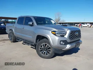 2020 Toyota Tacoma SR5 z VIN 3TMAZ5CN2LM120124, wystawiony jako IAAI lot #41720985 z przebiegiem 79 801 mil mil oraz . Historia ofert i sprzedaży dostępna na DreamBid. Obrazek 1.