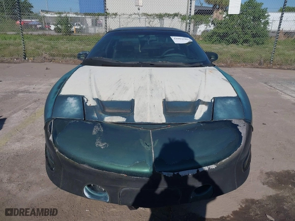 1996 Pontiac Firebird Formula with VIN 2G2FV22P5T2221912, listed as a IAAI auction lot 42004189 with 130,655 mi miles. Bid and sale history available at carsss.com. Image 6.