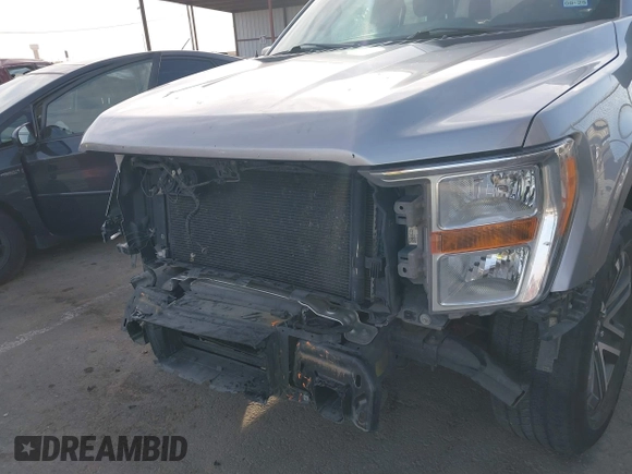 2021 Ford F-150 XL z VIN 1FTEW1CP1MFA69303, wystawiony jako IAAI lot #41593902 z przebiegiem 116 841 mil mil oraz . Historia ofert i sprzedaży dostępna na DreamBid. Obrazek 6.