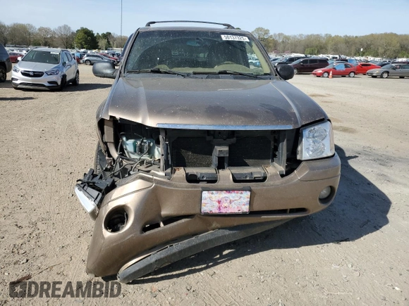 2003 GMC Envoy SLT z VIN 1GKDS13S032134647, wystawiony jako Copart lot #50137325 z przebiegiem 217 878 mil mil oraz Szkody całkowita. Historia ofert i sprzedaży dostępna na DreamBid. Obrazek 5.