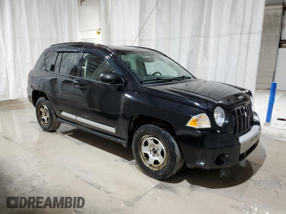2007 Jeep Compass Limited with VIN 1J8FF57W77D241355, listed as a Copart auction lot 83786884 with 241,742 mi miles and Salvage Title. Bid and sale history available at carsss.com. Image 4.
