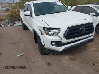 2021 Toyota Tacoma SR with VIN 3TYAX5GN6MT018475, listed as a IAAI auction lot 41966835 with 42,780 mi miles and . Bid and sale history available at DreamBid. Image 6.