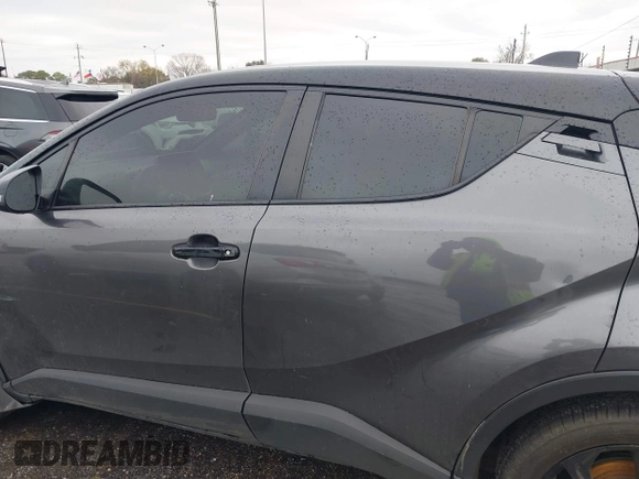 2021 Toyota C-HR LE with VIN JTNKHMBX0M1129080, listed as a IAAI auction lot 41321604 with 52,916 mi miles. Bid and sale history available at carsss.com. Image 14.