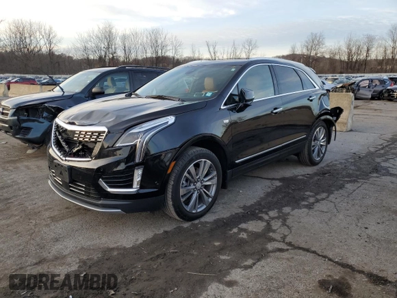 2022 Cadillac XT5 AWD Premium Luxury with VIN 1GYKNDR46NZ113732, listed as a Copart auction lot 82645394 with 26,862 mi miles and Salvage title. Bid and sale history available at DreamBid. Image 1.