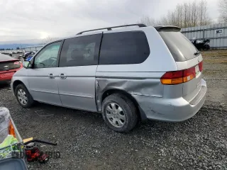 2002 Honda Odyssey EX z VIN 2HKRL18692H578746, wystawiony jako Copart lot #51281845 z przebiegiem 282 844 mil mil oraz Szkoda całkowita • Salvage title. Historia ofert i sprzedaży dostępna na DreamBid. Obrazek 2.