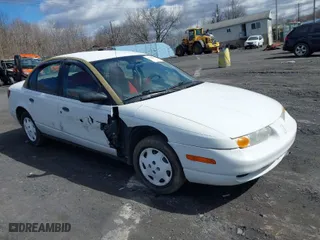 2000 Saturn SL with VIN 1G8ZH5280YZ251280, listed as a IAAI auction lot 41742836 with 180,249 mi miles. Bid and sale history available at carsss.com. Image 1.