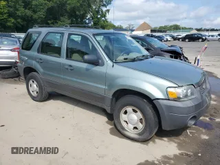 2007 Ford Escape XLS with VIN 1FMYU02Z27KB99534, listed as a Copart auction lot 66872184 with 107,072 mi miles and Salvage Title. Bid and sale history available at carsss.com. Image 4.