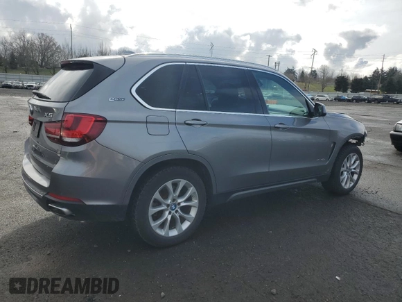 2018 BMW X5 xDrive40e iPerformance with VIN 5UXKT0C57J0V99079, listed as a Copart auction lot 44621905 with 57,556 mi miles and Salvage Title. Bid and sale history available at carsss.com. Image 3.