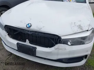 2019 BMW 5 Series 530e with VIN WBAJA9C58KB399175, listed as a IAAI auction lot 41697211 with Not provided miles and . Bid and sale history available at DreamBid. Image 6.