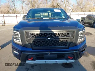2021 Nissan Titan Pro-4X z VIN 1N6AA1ED1MN517476, wystawiony jako IAAI lot #41422217 z przebiegiem 62 650 mil mil oraz . Historia ofert i sprzedaży dostępna na DreamBid. Obrazek 12.