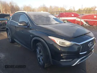 2018 Infiniti QX30 Luxury with VIN SJKCH5CR4JA046890, listed as a IAAI auction lot 41126484 with 92,165 mi miles and . Bid and sale history available at DreamBid. Image 1.