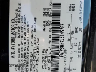 2018 Ford Mustang EcoBoost Premium z VIN 1FATP8UHXJ5145287, wystawiony jako Copart lot #60152705 z przebiegiem 75 119 mil mil oraz Szkoda całkowita • Salvage title. Historia ofert i sprzedaży dostępna na DreamBid. Obrazek 12.