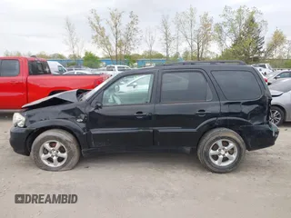 2005 Mazda Tribute S with VIN 4F2YZ96145KM32776, listed as a IAAI auction lot 42159162 with 200,416 mi miles and . Bid and sale history available at DreamBid. Image 13.
