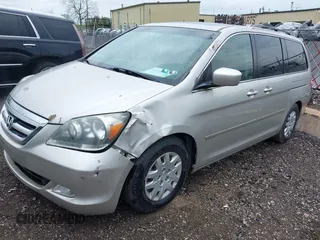 2006 Honda Odyssey TOURING with VIN 5FNRL38836B102719, listed as a IAAI auction lot 42170294 with 180,956 mi miles. Bid and sale history available at carsss.com. Image 2.
