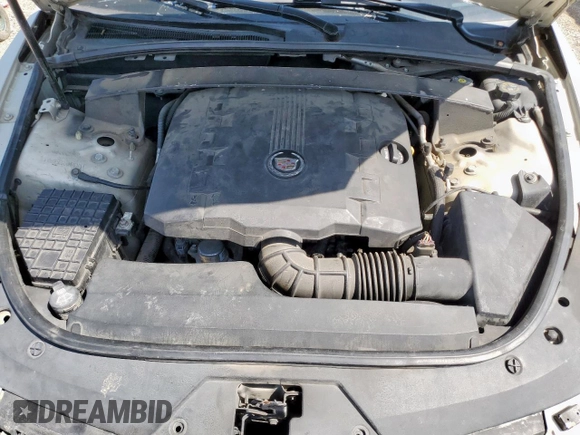 2010 Cadillac CTS Luxury z VIN 1G6DE5EG7A0126205, wystawiony jako Copart lot #57298035 z przebiegiem 168 822 mil mil oraz Szkoda całkowita • Salvage title. Historia ofert i sprzedaży dostępna na DreamBid. Obrazek 11.