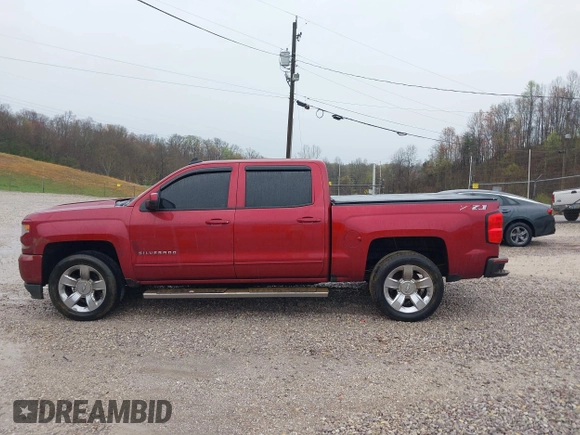 2018 Chevrolet Silverado 1500 LT with VIN 3GCUKREC2JG201754, listed as a IAAI auction lot 41944175 with 112,305 mi miles. Bid and sale history available at carsss.com. Image 15.