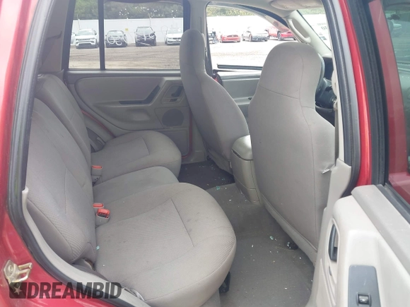 2003 Jeep Grand Cherokee Laredo with VIN 1J4GW48S73C611070, listed as a IAAI auction lot 42319030 with 177,771 mi miles and . Bid and sale history available at DreamBid. Image 8.