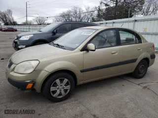 2009 Kia Rio SX with VIN KNADE223796524159, listed as a Copart auction lot 86185964 with 157,061 mi miles and Salvage Title. Bid and sale history available at carsss.com. Image 1.