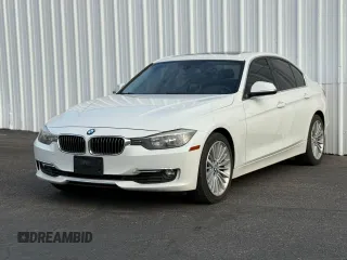2013 BMW 3 Series 328i with VIN WBA3C1C59DF437433, listed as a Copart auction lot 65803415 with 103,062 mi miles and Clean title. Bid and sale history available at DreamBid. Image 2.
