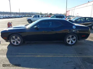 2016 Dodge Challenger SXT with VIN 2C3CDZAG9GH117409, listed as a IAAI auction lot 41677024 with 158,334 mi miles. Bid and sale history available at carsss.com. Image 14.