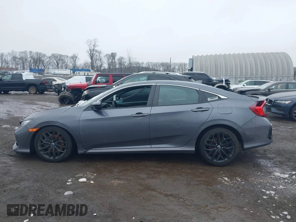 2020 Honda Civic Si with VIN 2HGFC1E55LH707320, listed as a IAAI auction lot 41569008 with 65,441 mi miles and . Bid and sale history available at DreamBid. Image 14.