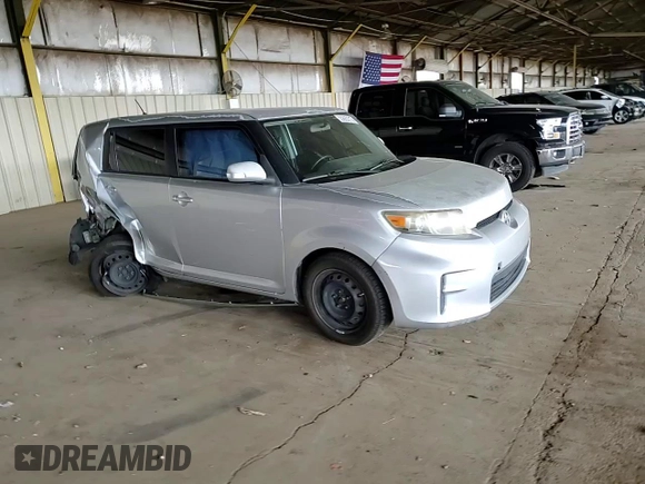 2012 Scion xB with VIN JTLZE4FE5CJ023537, listed as a Copart auction lot 55863315 with 230,648 mi miles and Salvage Title. Bid and sale history available at DreamBid. Image 13.