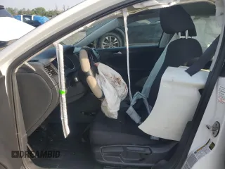2015 Volkswagen Jetta S z VIN 3VW2K7AJ2FM309510, wystawiony jako Copart lot #60823955 z przebiegiem Nie podano mil oraz Szkoda całkowita • Salvage title. Historia ofert i sprzedaży dostępna na DreamBid. Obrazek 7.