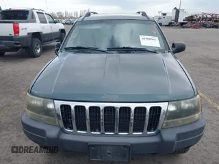 2003 Jeep Grand Cherokee Laredo with VIN 1J4GX48S03C536709, listed as a IAAI auction lot 41908946 with 240,435 mi miles. Bid and sale history available at carsss.com. Image 6.