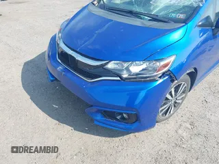 2020 Honda Fit EX z VIN 3HGGK5H88LM722092, wystawiony jako IAAI lot #42172138 z przebiegiem 59 140 mil mil oraz . Historia ofert i sprzedaży dostępna na DreamBid. Obrazek 6.