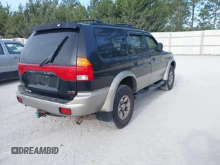 1999 Mitsubishi Montero Sport LS with VIN JA4MT31HXXP024168, listed as a IAAI auction lot 42064951 with 123,539 mi miles. Bid and sale history available at carsss.com. Image 4.
