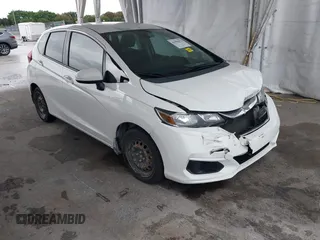2018 Honda Fit LX with VIN 3HGGK5H49JM734620, listed as a IAAI auction lot 41984212 with 106,427 mi miles. Bid and sale history available at carsss.com. Image 1.