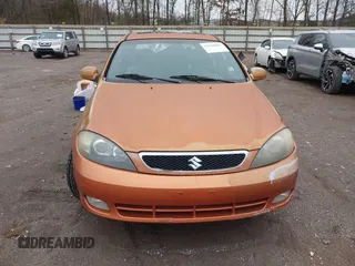 2005 Suzuki Reno z VIN KL5JJ66Z85K160610, wystawiony jako IAAI lot #41526883 z przebiegiem Nie podano mil oraz . Historia ofert i sprzedaży dostępna na DreamBid. Obrazek 6.