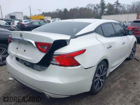 2016 Nissan Maxima S with VIN 1N4AA6AP2GC412533, listed as a IAAI auction lot 41831813 with 122,933 mi miles and . Bid and sale history available at DreamBid. Image 4.