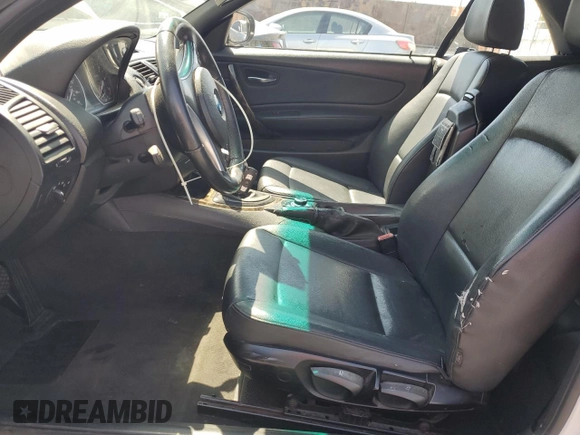 2010 BMW 1 Series 128i with VIN WBAUN1C51AVH81745, listed as a Copart auction lot 54379595 with 169,839 mi miles and Clean title. Bid and sale history available at DreamBid. Image 7.