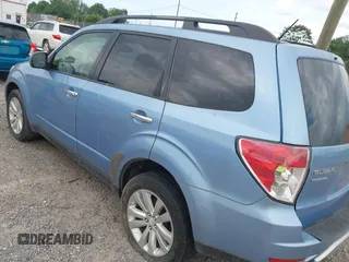 2011 Subaru Forester X Limited with VIN JF2SHAECXBH704853, listed as a IAAI auction lot 42500091 with 156,140 mi miles and . Bid and sale history available at DreamBid. Image 3.